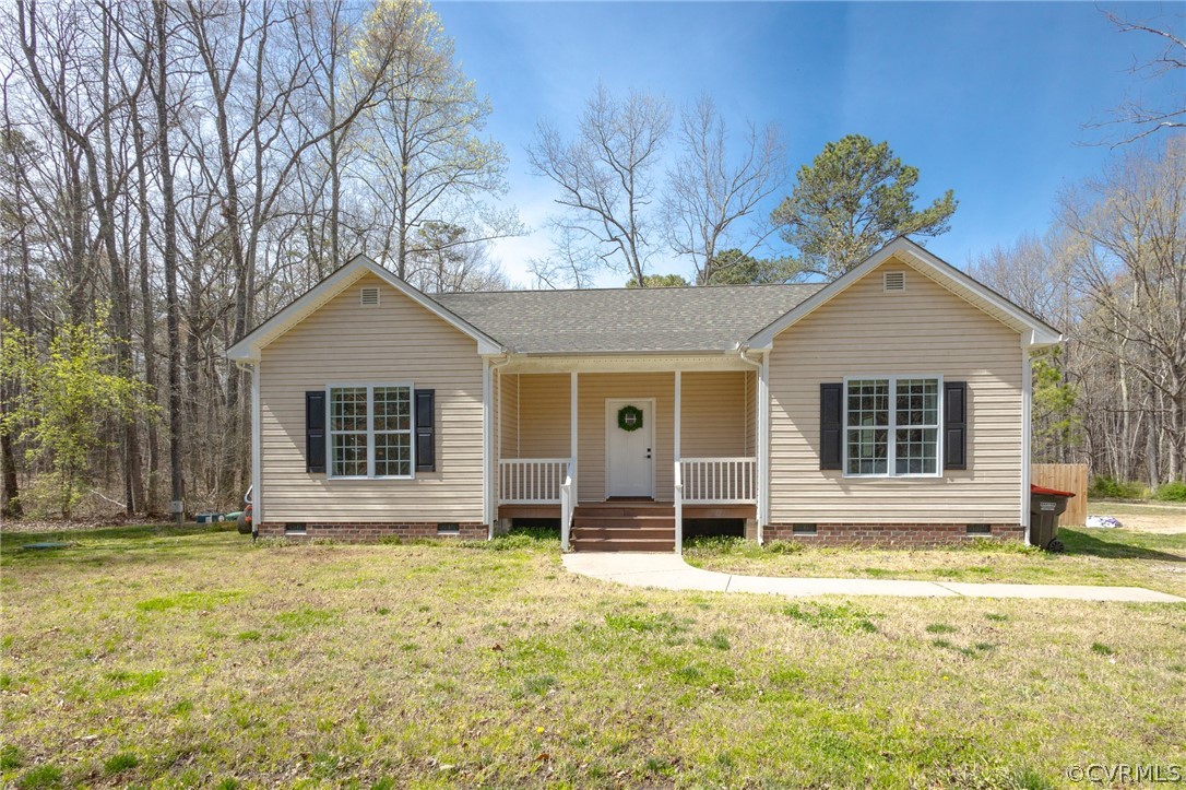 2406 Emanuel Church Road Powhatan, VA 23139 - Photo 1 of 50 front view of a house with a yard