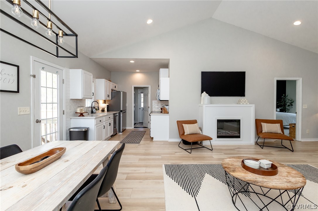 2406 Emanuel Church Road Powhatan, VA 23139 - Photo 15 of 50 a living room with furniture fireplace and a flat screen tv