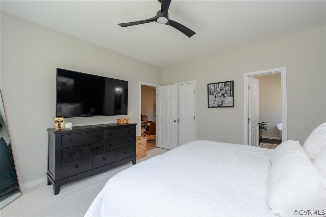 2406 Emanuel Church Road Powhatan, VA 23139 - Photo 26 of 50 a bedroom with a bed and a flat tv screen on dresser