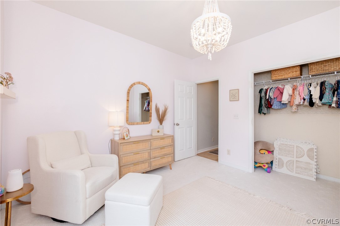 2406 Emanuel Church Road Powhatan, VA 23139 - Photo 35 of 50 a bedroom with furniture and a chandelier