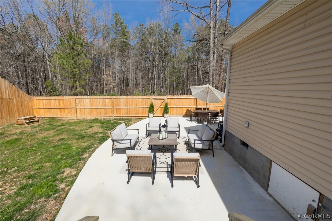 2406 Emanuel Church Road Powhatan, VA 23139 - Photo 43 of 50 a view of backyard with seating space and trees