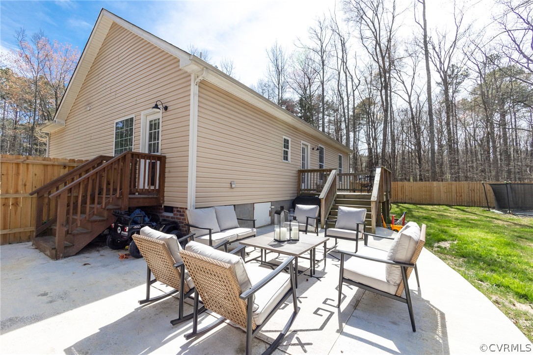 2406 Emanuel Church Road Powhatan, VA 23139 - Photo 45 of 50 a view of backyard with outdoor seating a patio and plants