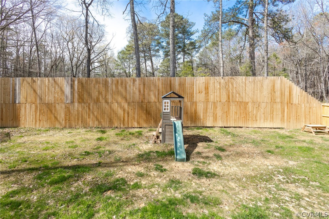 2406 Emanuel Church Road Powhatan, VA 23139 - Photo 47 of 50 a backyard of a house