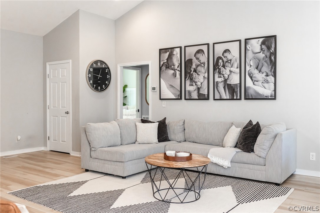 2406 Emanuel Church Road Powhatan, VA 23139 - Photo 7 of 50 a living room with furniture a wall and a table