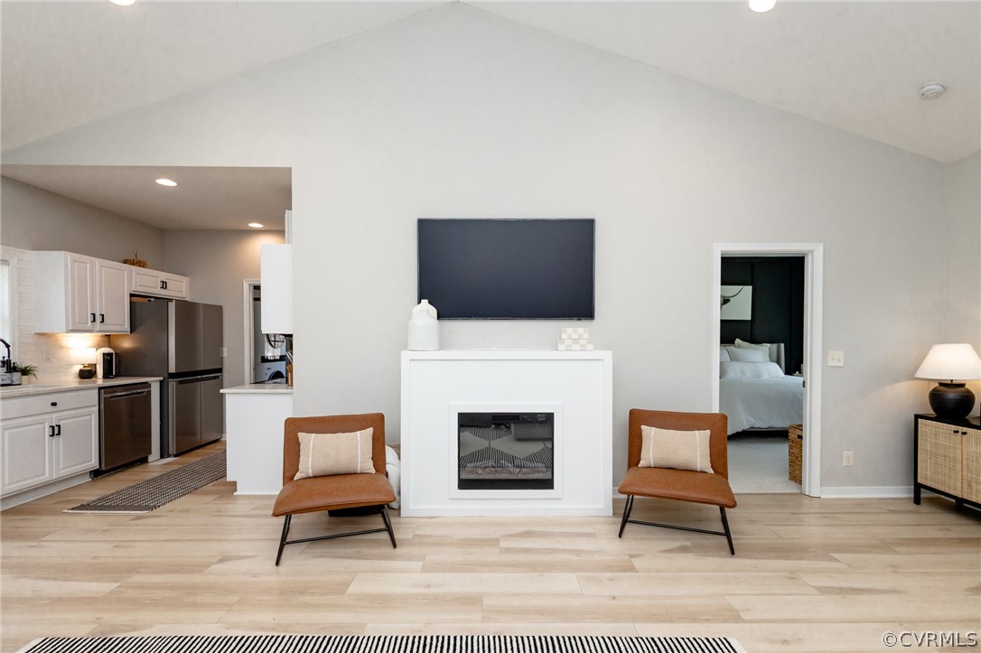 2406 Emanuel Church Road Powhatan, VA 23139 - Photo 10 of 50 a living room with furniture a fireplace and a flat screen tv