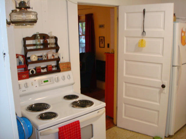 31 Madrona Road Miranda, CA 95553 - Photo 18 of 41 a kitchen with a stove and a refrigerator