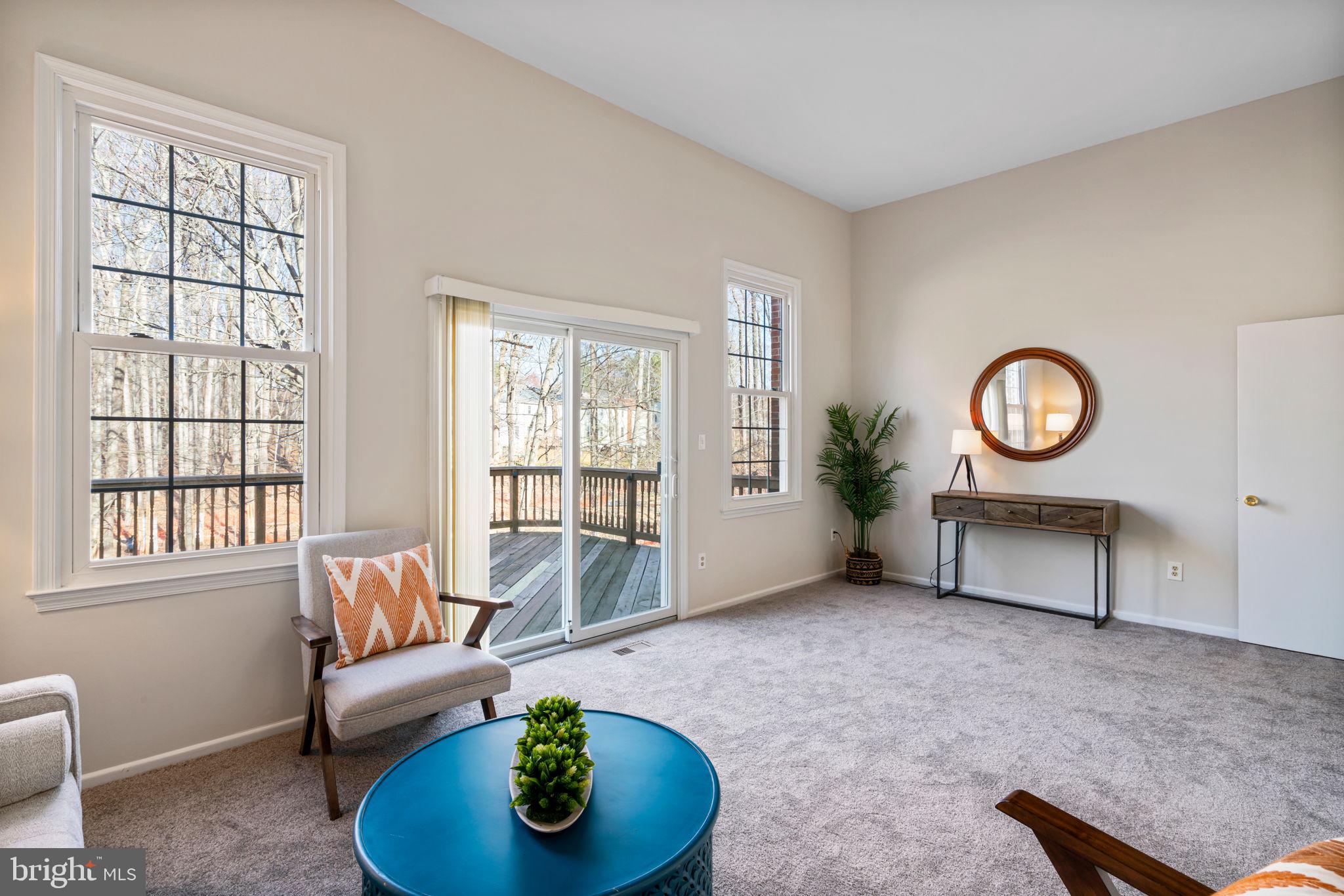 5702 Kirkham Court Springfield, VA 22151 - Photo 1 of 36 a living room with furniture and a window