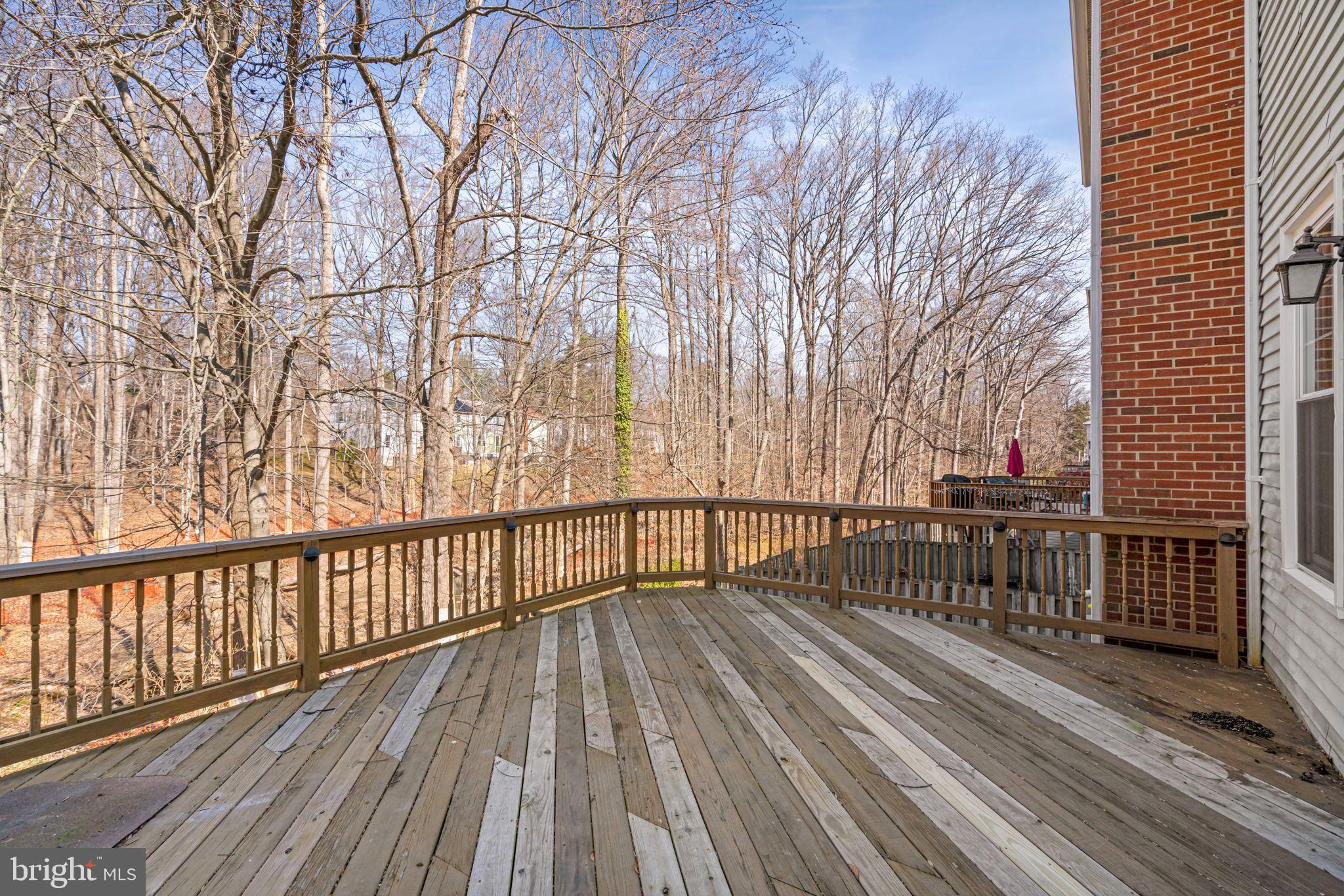 5702 Kirkham Court Springfield, VA 22151 - Photo 15 of 36 a view of balcony with wooden floor and fence