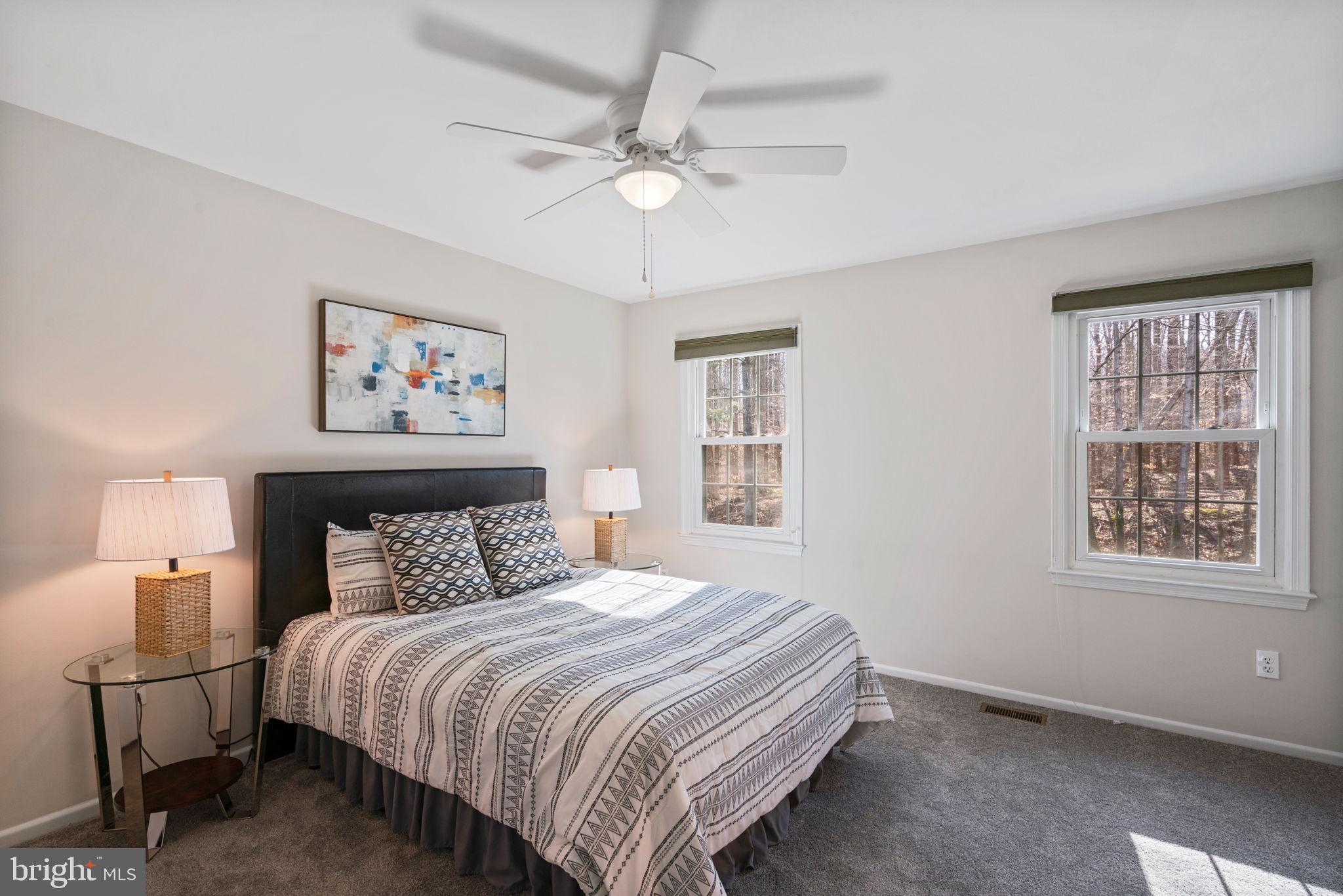 5702 Kirkham Court Springfield, VA 22151 - Photo 18 of 36 a bedroom with a bed and a window