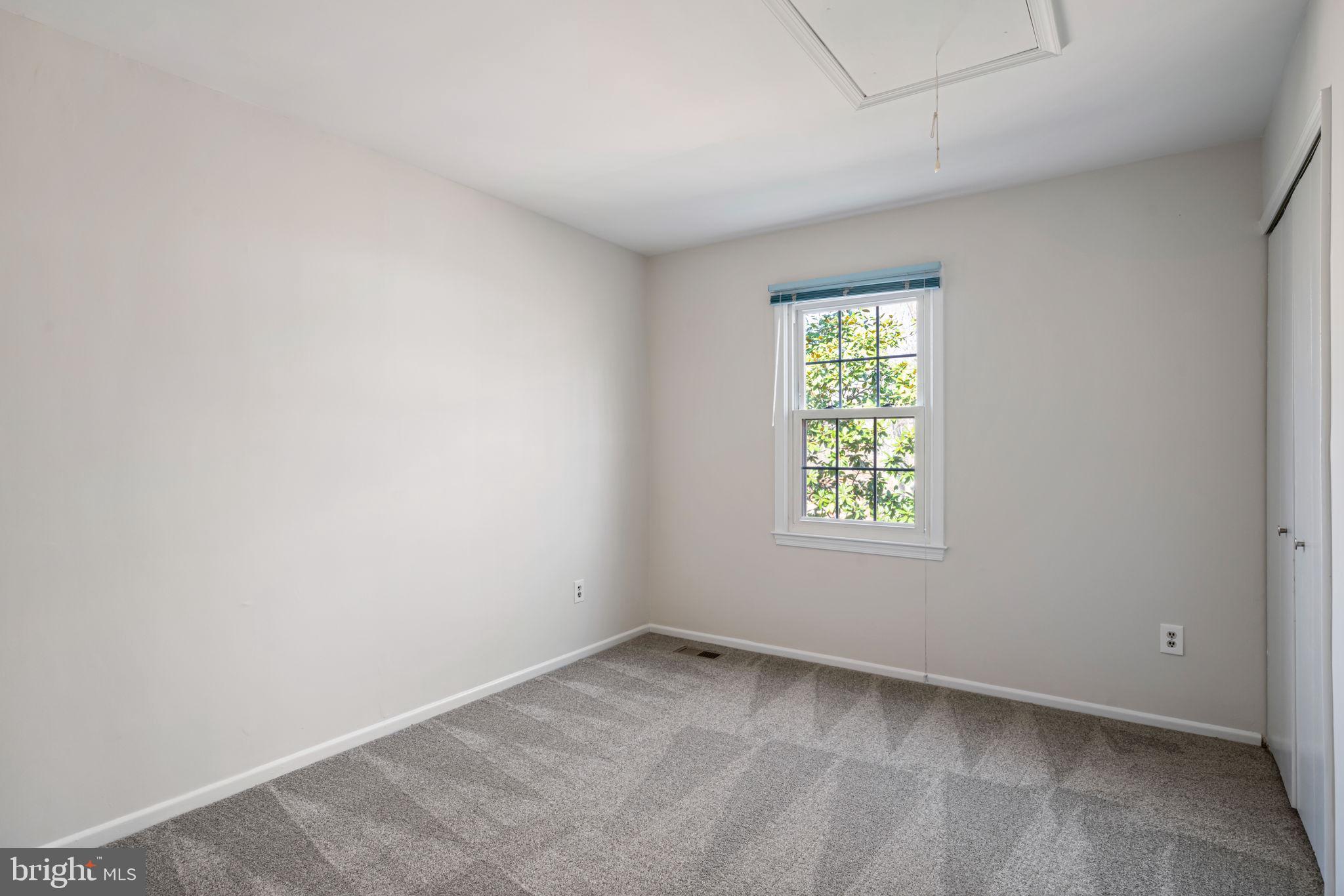 5702 Kirkham Court Springfield, VA 22151 - Photo 24 of 36 an empty room with a window