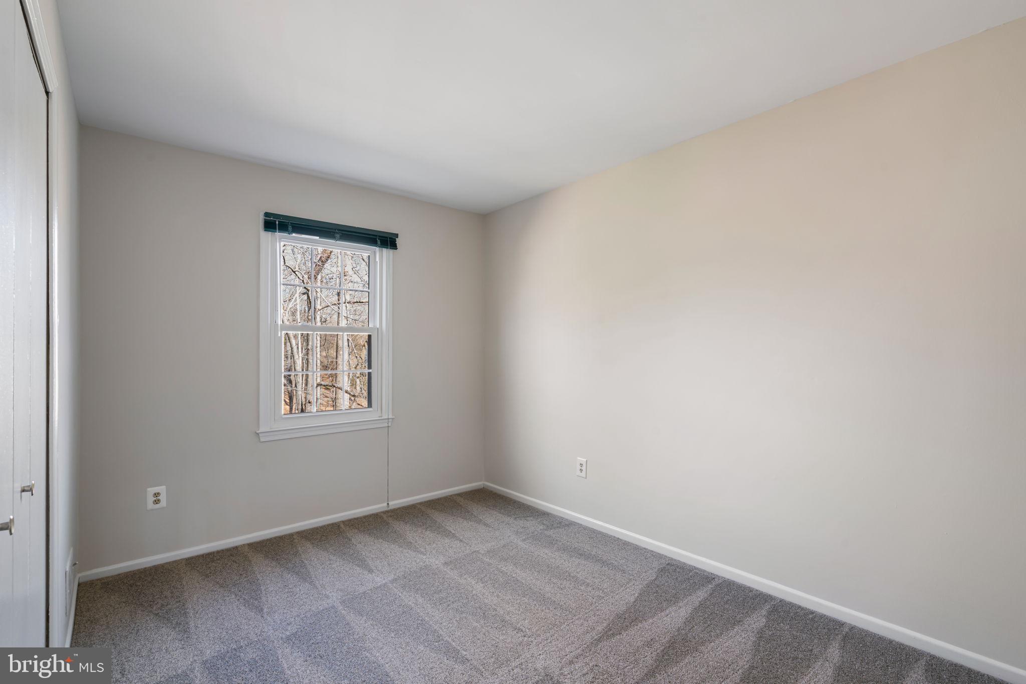 5702 Kirkham Court Springfield, VA 22151 - Photo 26 of 36 an empty room with a window