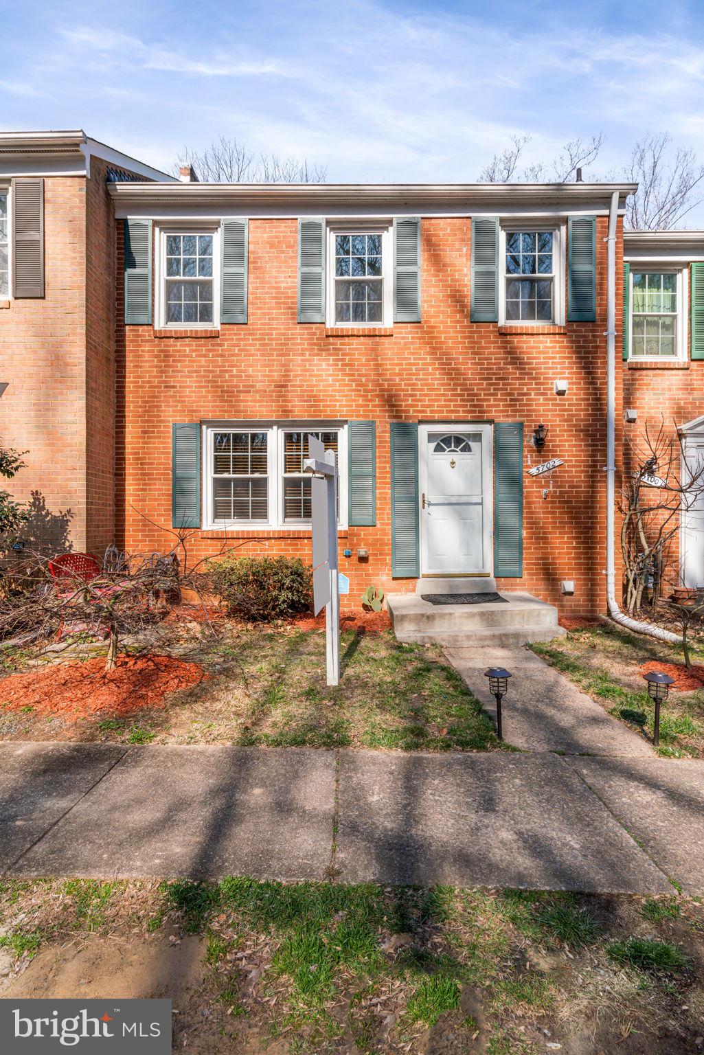 5702 Kirkham Court Springfield, VA 22151 - Photo 3 of 36 a front view of a house with garden