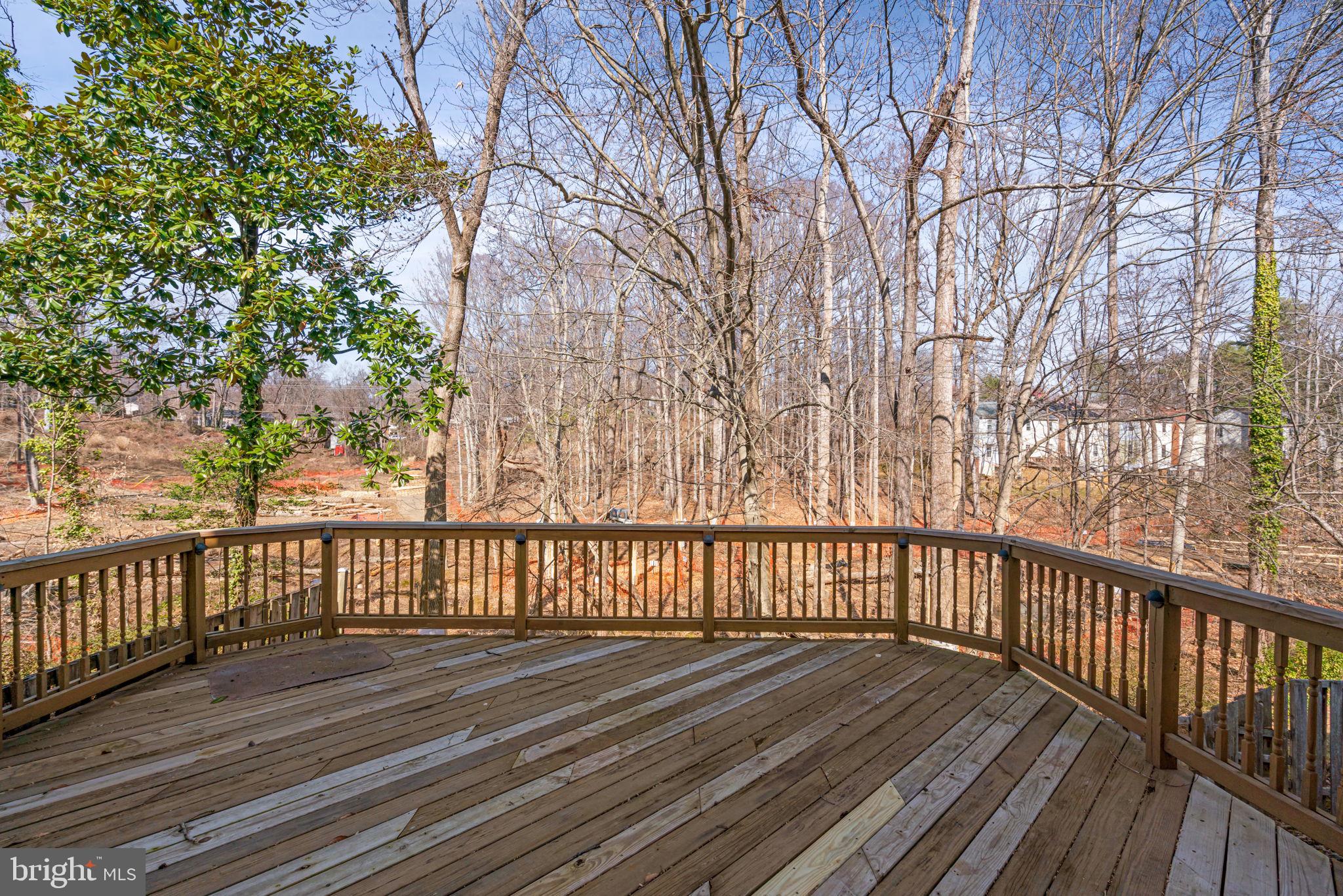 5702 Kirkham Court Springfield, VA 22151 - Photo 35 of 36 a view of a wooden roof deck