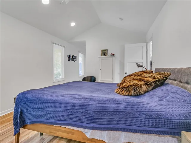 a bathroom with a sink toilet and a mirror