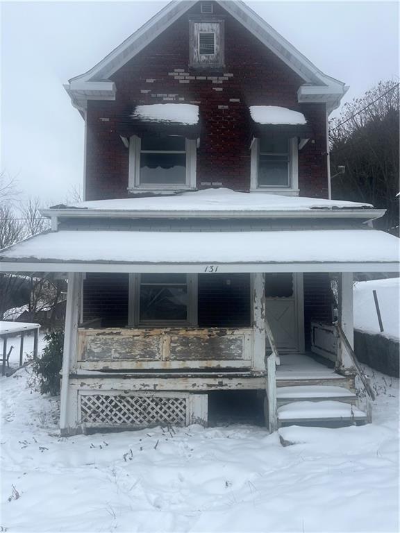 a view of entryway with a front door