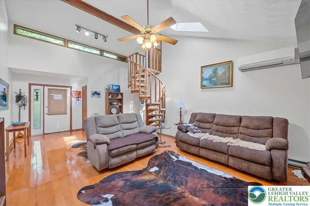 a bedroom with a bed and a lamp