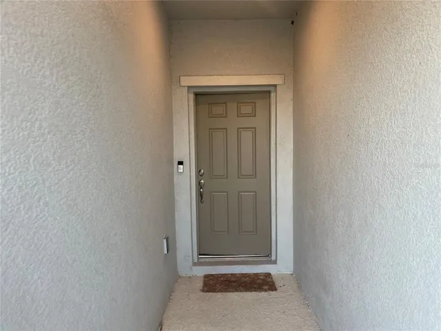 a view of a hallway with closet area