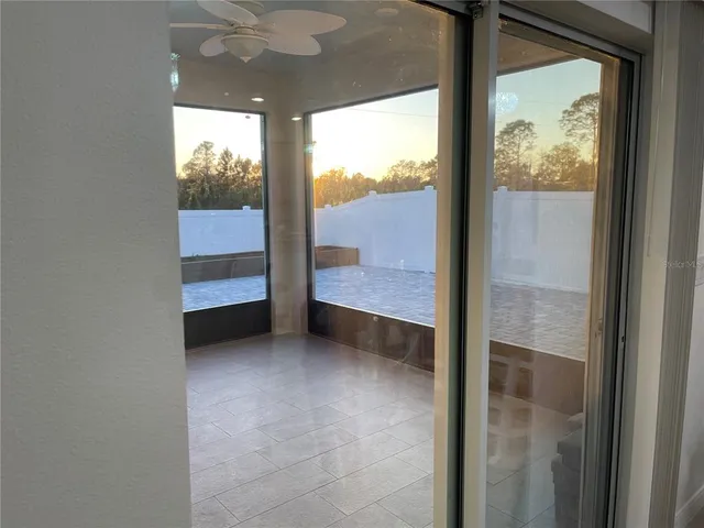 a view of an empty room and window