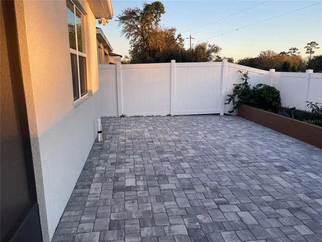 a view of a backyard of the house