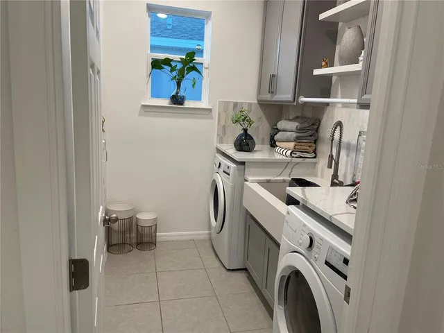 a utility room with dryer and washer