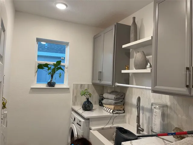 a view of storage and utility room