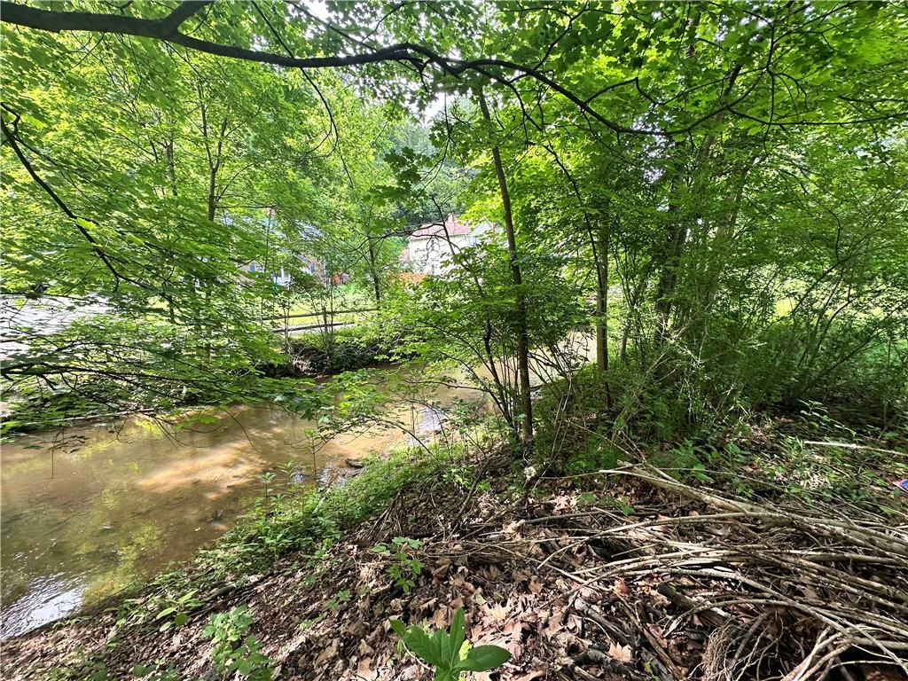 0 Johnson Hollow Road Fayette City, PA 15438 - Photo 24 of 42 a backyard of a house with lots of green space