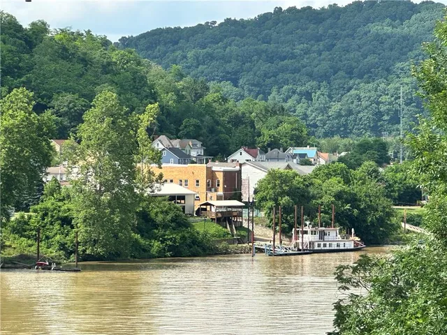 a view of a house with a lake view