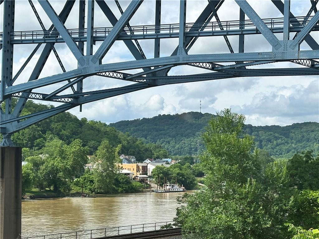 0 Johnson Hollow Road Fayette City, PA 15438 - Photo 41 of 42 a view of swimming pool with a yard and wooden fence
