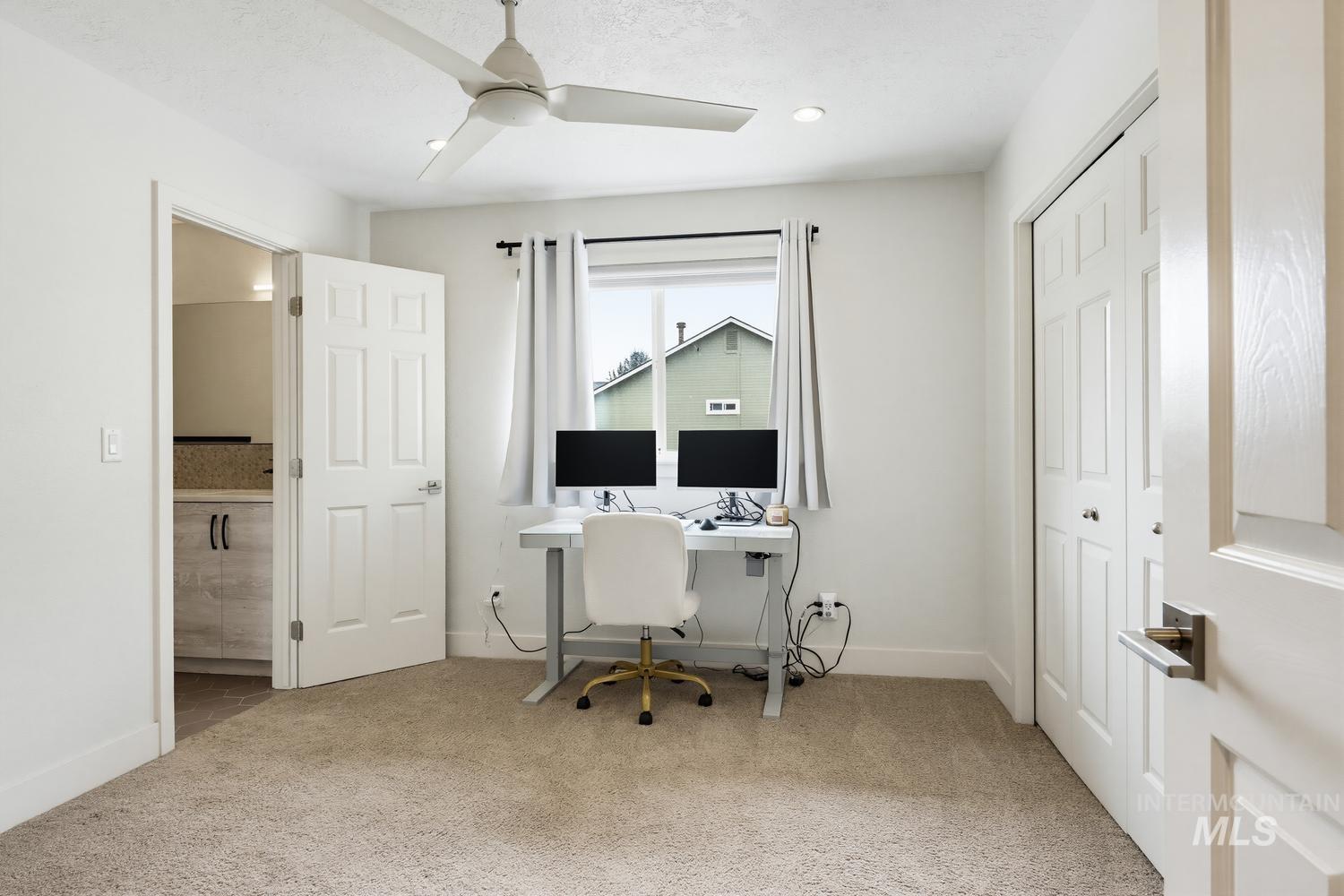 369 South Winthrop Way Boise, ID 83709 - Photo 36 of 50 Carpeted room with a ceiling fan, recessed lighting, and a window with white curtains