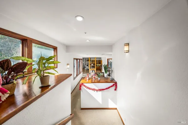 a room with wooden floor and furniture