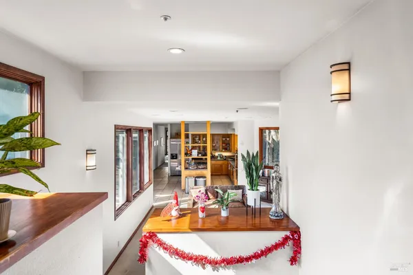 a living room with furniture and a table