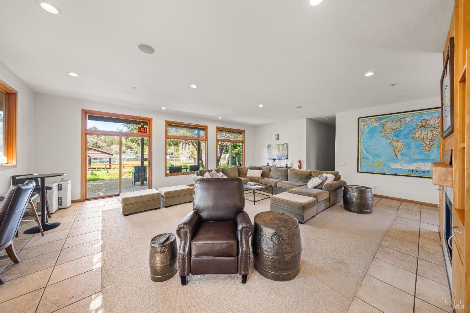 8 Circle Road San Rafael, CA 94903 - Photo 18 of 48 a living room with furniture large window and flat screen tv