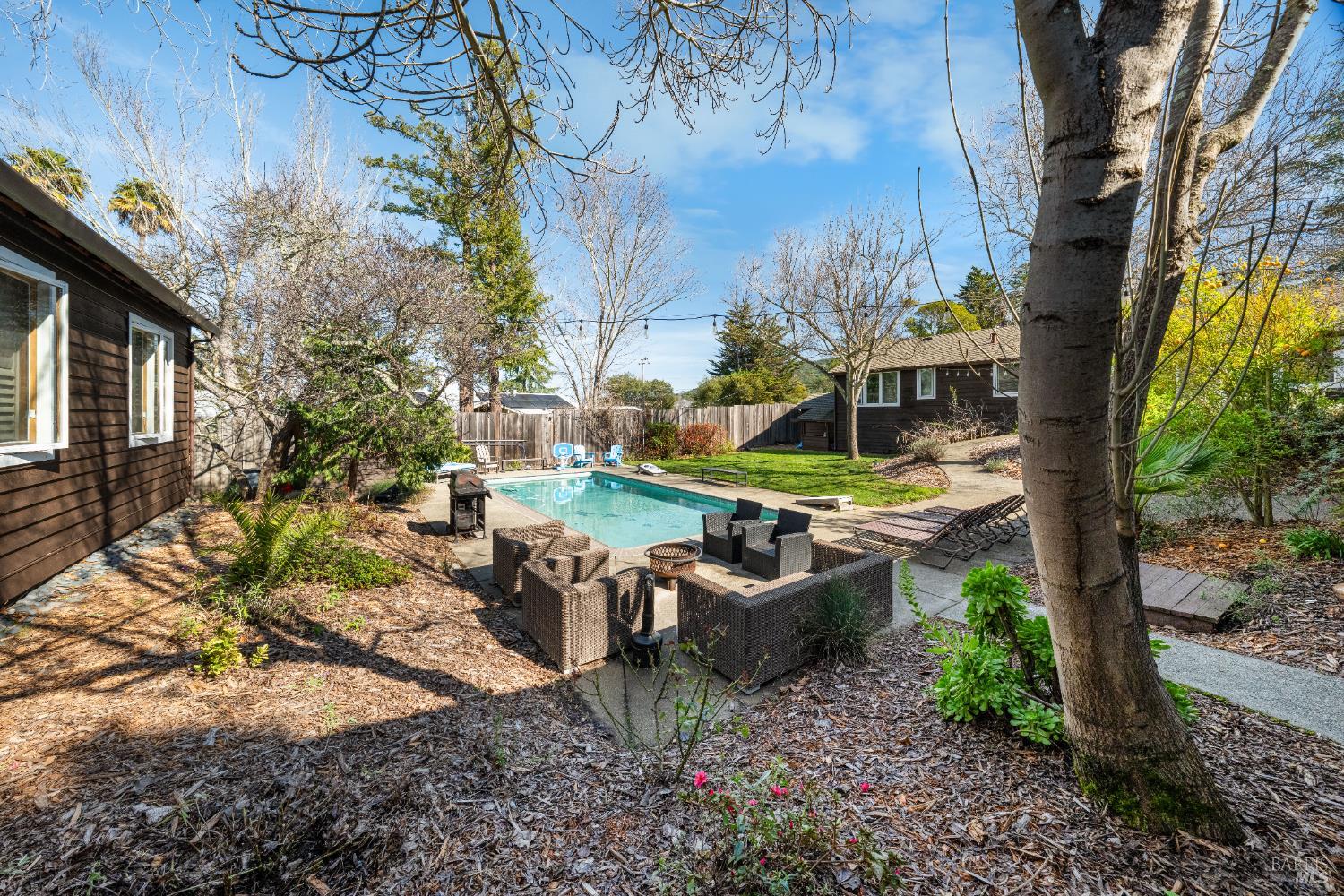 8 Circle Road San Rafael, CA 94903 - Photo 23 of 48 a view of a patio with table and chairs and potted plants