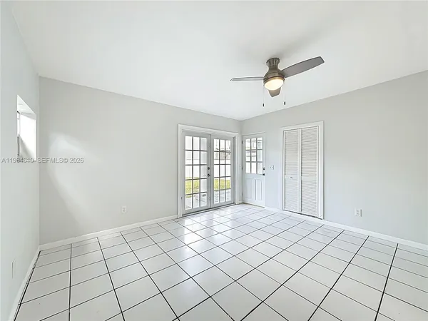 a view of an empty room and window