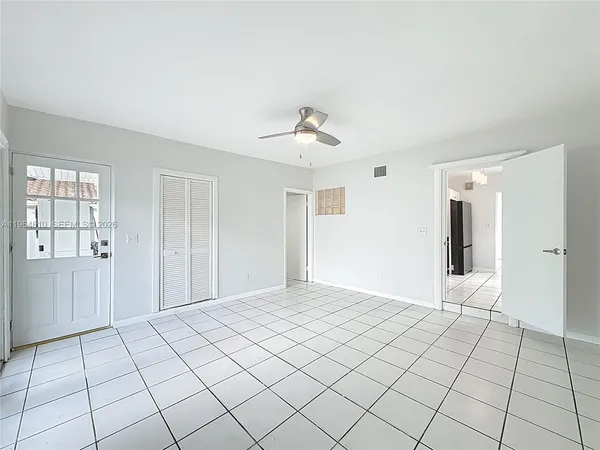 a view of an empty room and window
