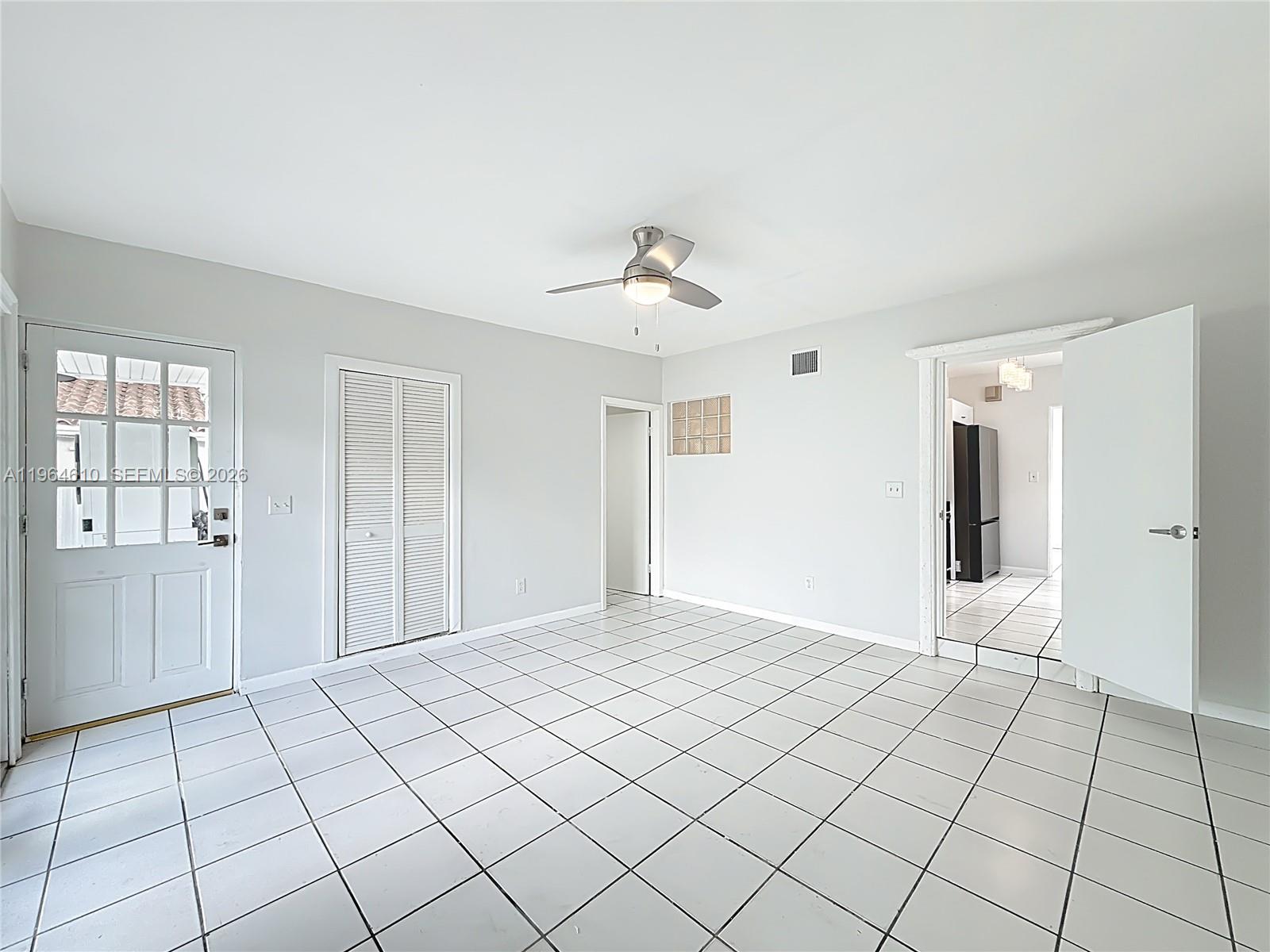 6819 Southwest 25th Street Miami, FL 33155 - Photo 9 of 25 a view of an empty room and window