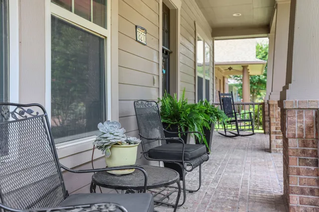 a view of a chairs and table in a patio