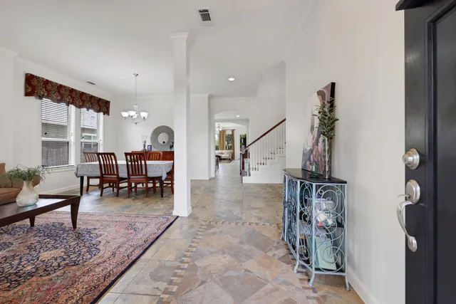 a view of a livingroom with furniture and a rug