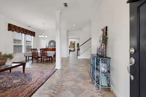 a view of a livingroom with furniture and a rug