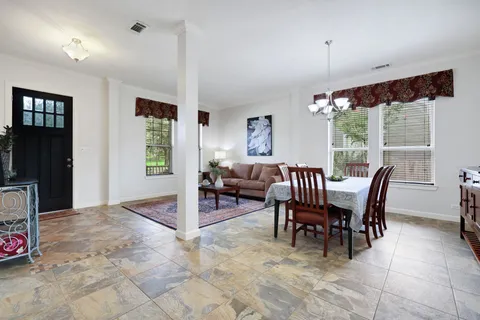 a view of a livingroom with furniture and window