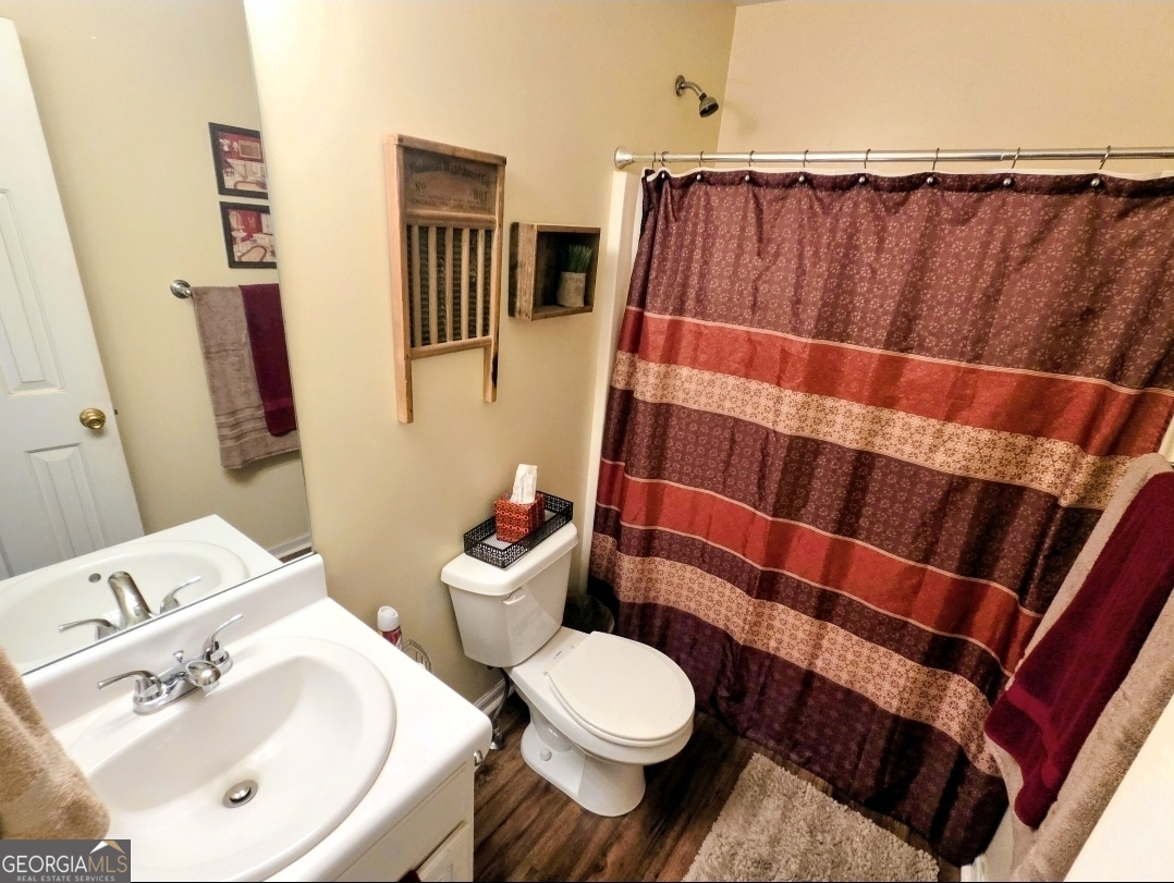 21 Baskin Heights Path Temple, GA 30179 - Photo 23 of 44 a bathroom with a sink and a mirror