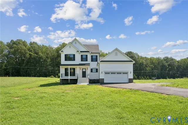 a house view with a garden space