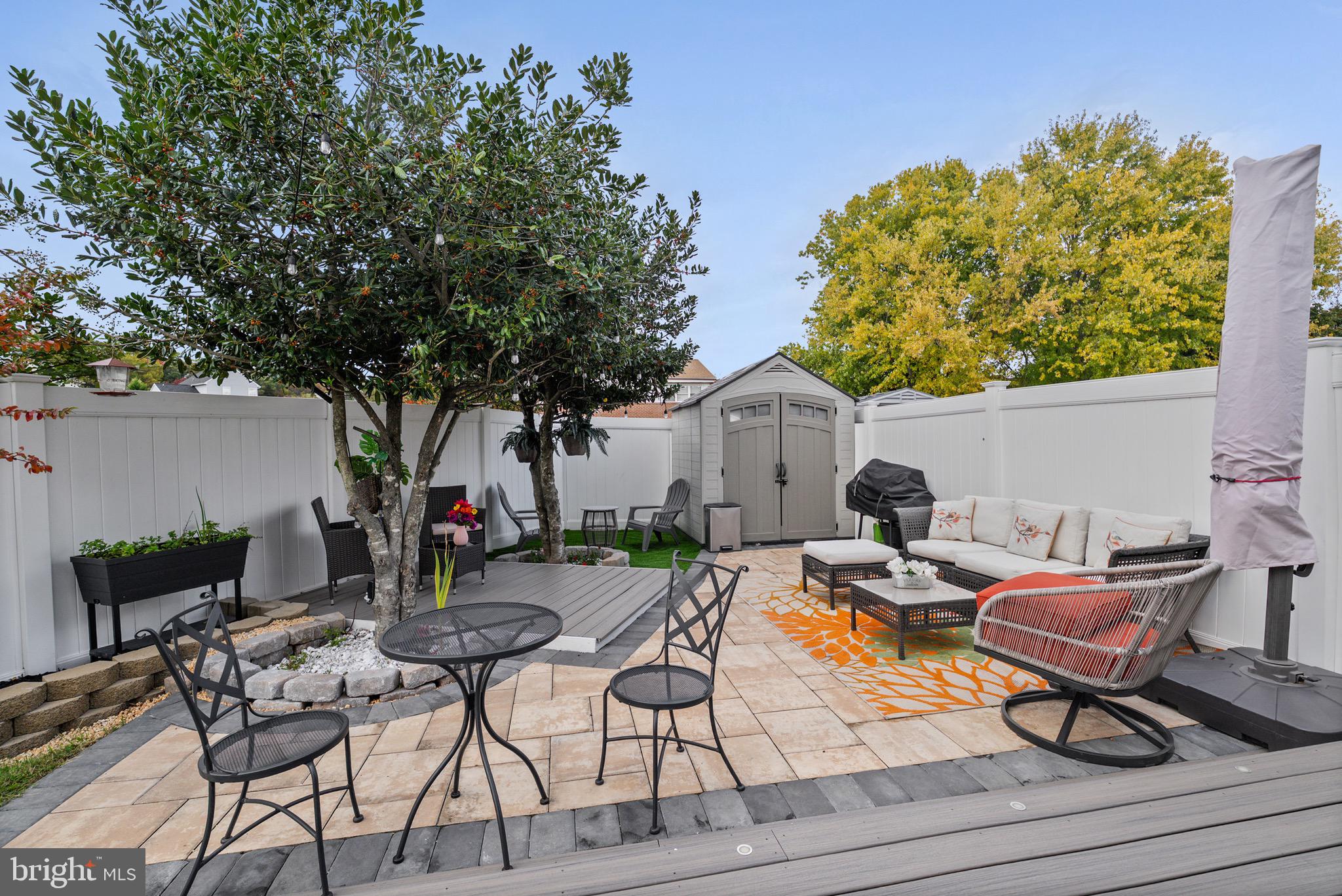 1901 Graymount Way Edgewood, MD 21040 - Photo 9 of 24 a view of patio with table and chairs and potted plants