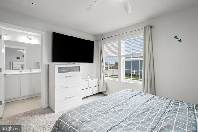 a view of a chairs and table on the wooden deck