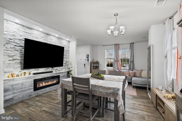 a picture of a room with a white wall and a picture