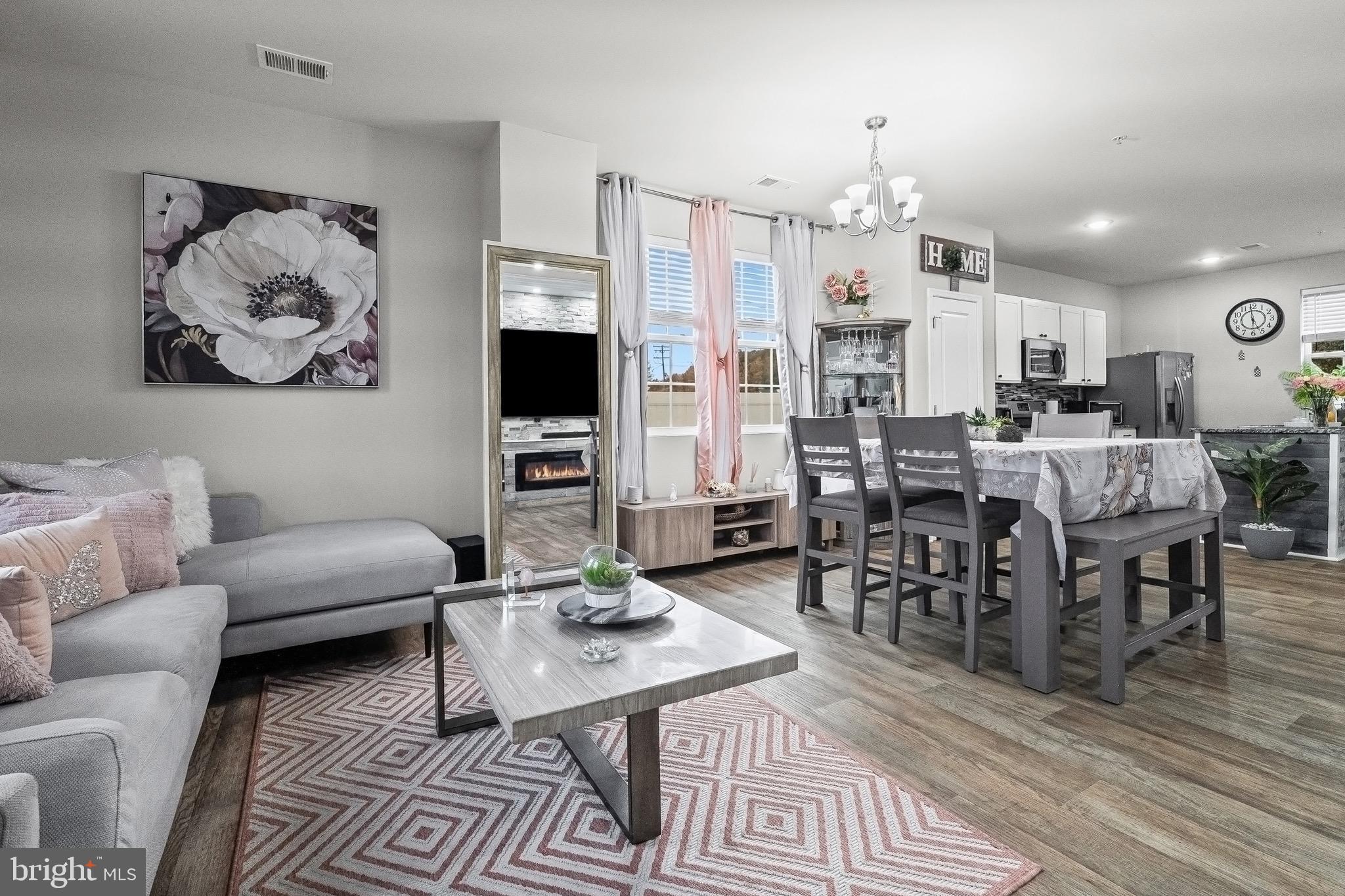 1901 Graymount Way Edgewood, MD 21040 - Photo 24 of 24 a living room with furniture kitchen view and a dining table