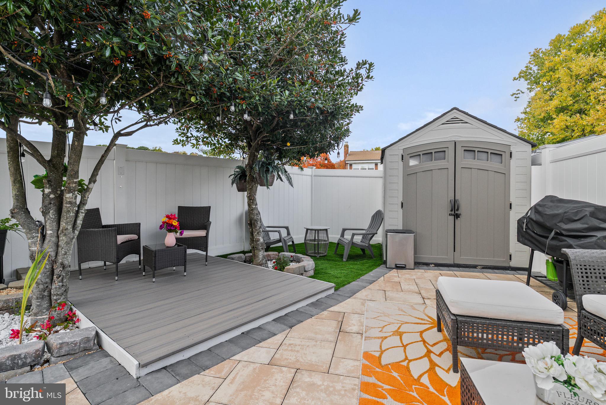 1901 Graymount Way Edgewood, MD 21040 - Photo 8 of 24 a view of a patio with table and chairs and potted plants