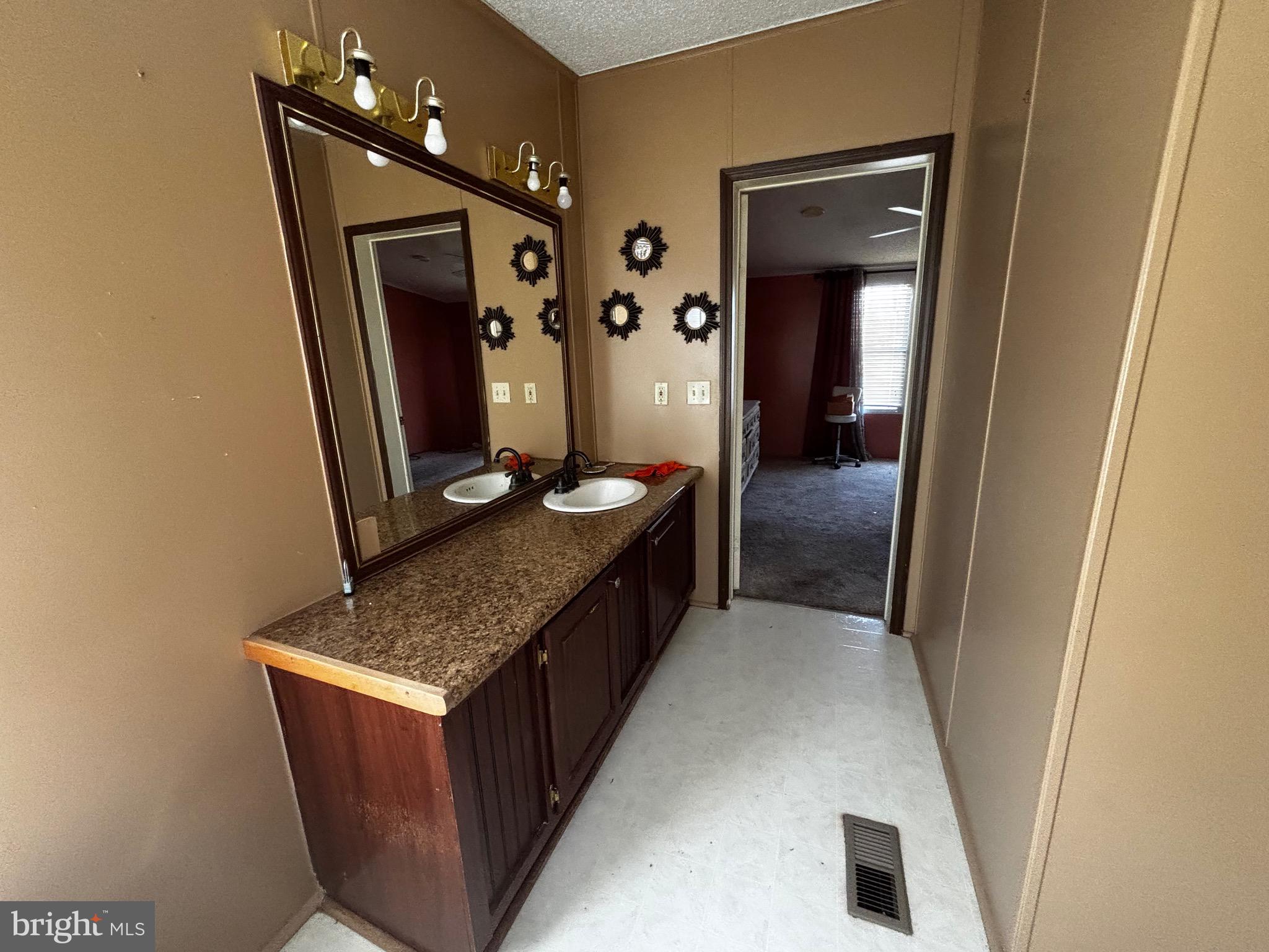101 Susan Place Dover, DE 19901 - Photo 8 of 8 a hallway with cabinets