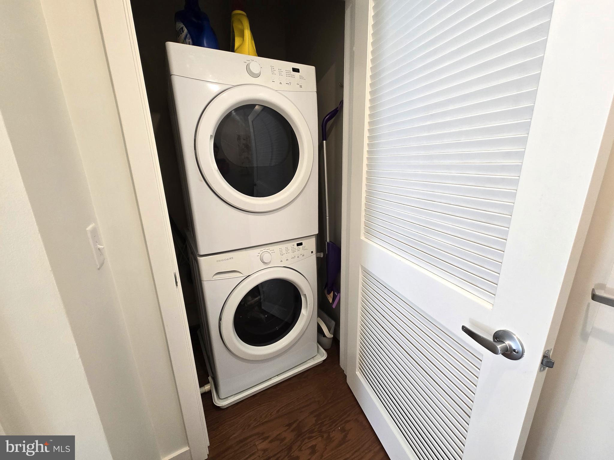 1320 Fenwick Lane, Unit 508 Silver Spring, MD 20910 - Photo 26 of 47 a utility room with dryer and washer
