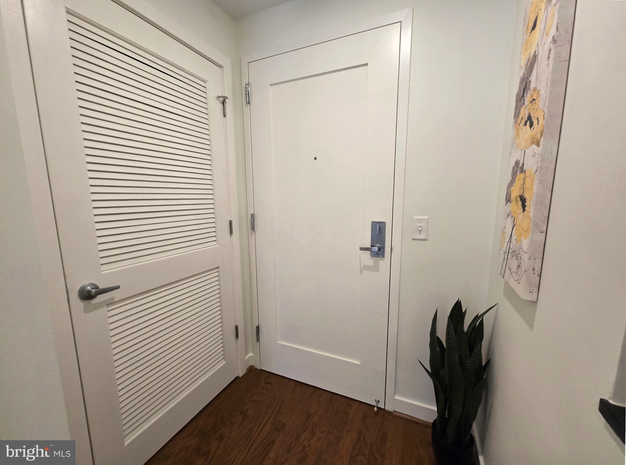 1320 Fenwick Lane, Unit 508 Silver Spring, MD 20910 - Photo 3 of 47 a view of a bathroom with a shower